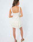 White mini dress with pleated hem for women