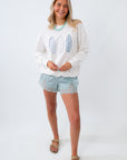 patchwork sweatshirt with surfboards and polkadots 