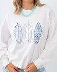 blue and white sweatshirt with surfboard pattern