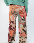 Back view of Ori Howdy Drawstring Pants showing detailed western graphics and comfortable elastic waistband for everyday wear.