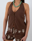 Matching brown embroidered shorts with starfish and shell design, casual summer beachwear for women