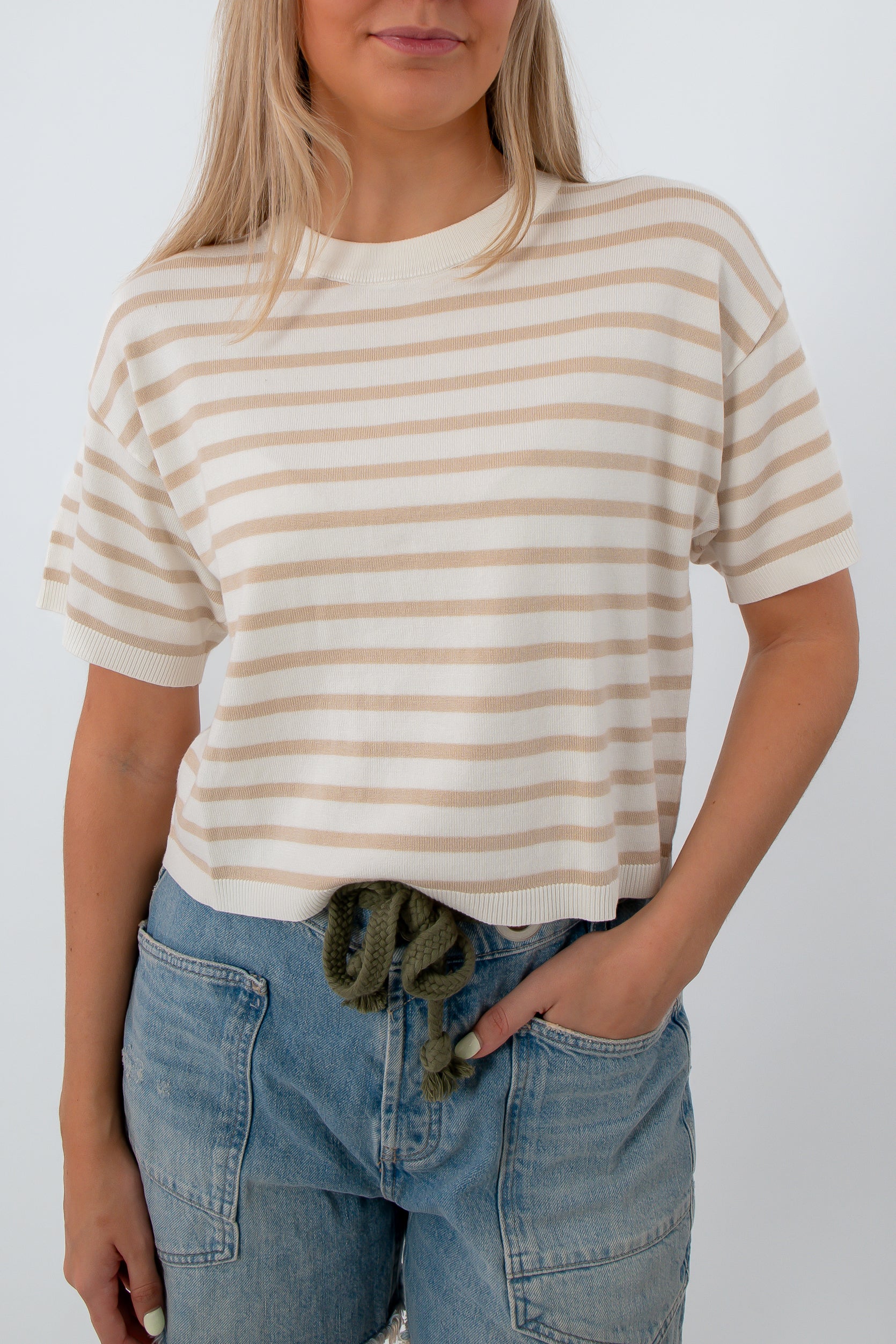 Close-up of striped knit tee, relaxed fit, casual style