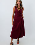 Burgundy V-neckline wrap dress with gold hardware, MinkPink burgundy dress, burgundy wedding guest dress, burgundy midi dress