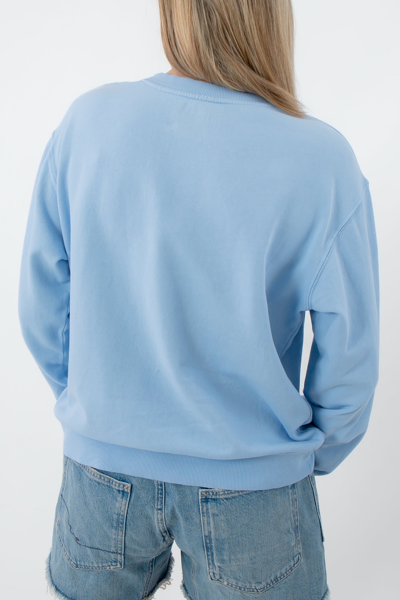 Light blue oversized crewneck sweatshirt from the back
