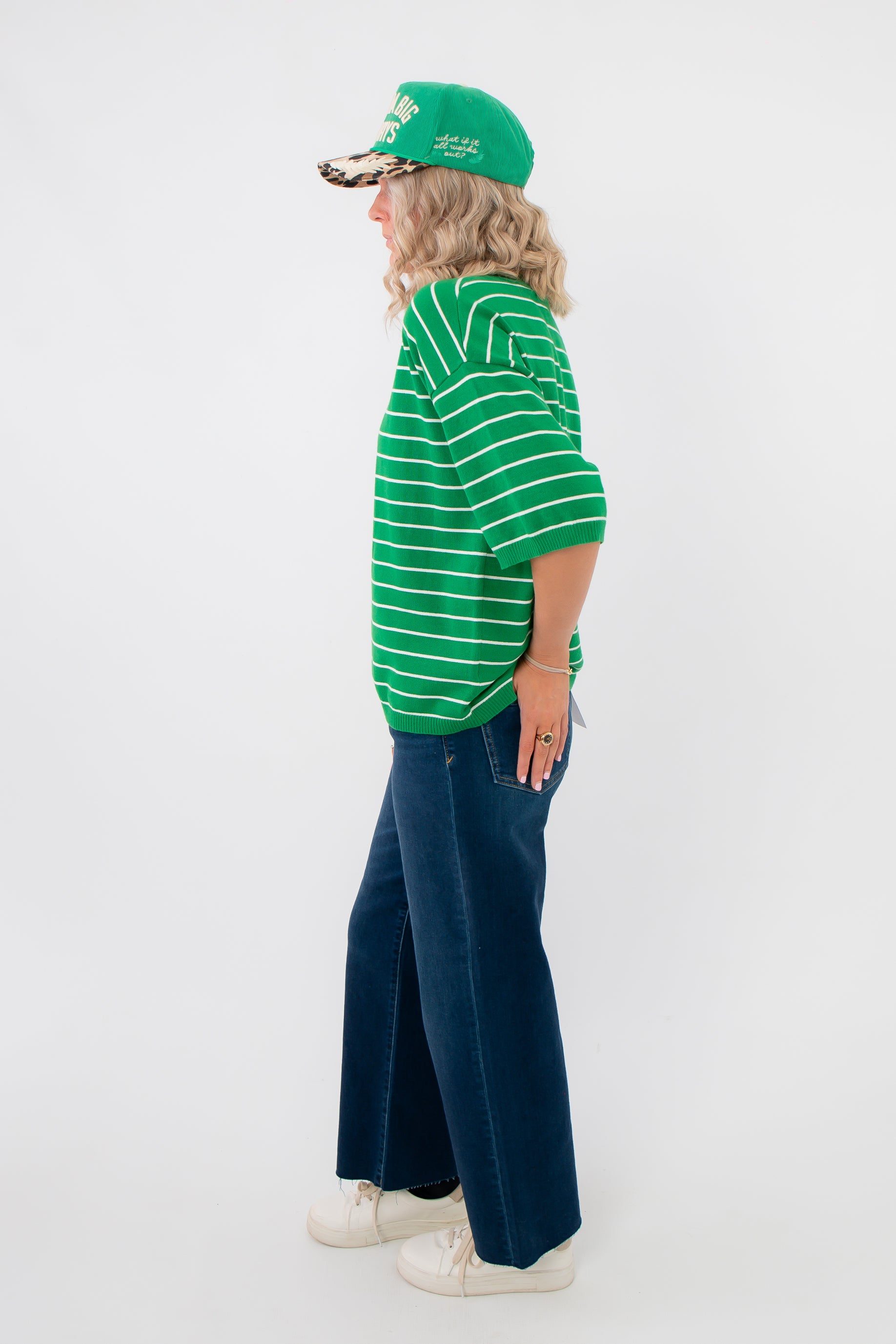 Gwen Green Striped Top – Side view of boxy fit green striped tee, ideal for relaxed styling with wide-leg jeans and casual accessories.