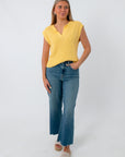 Front view of yellow textured sleeveless knit top for women
