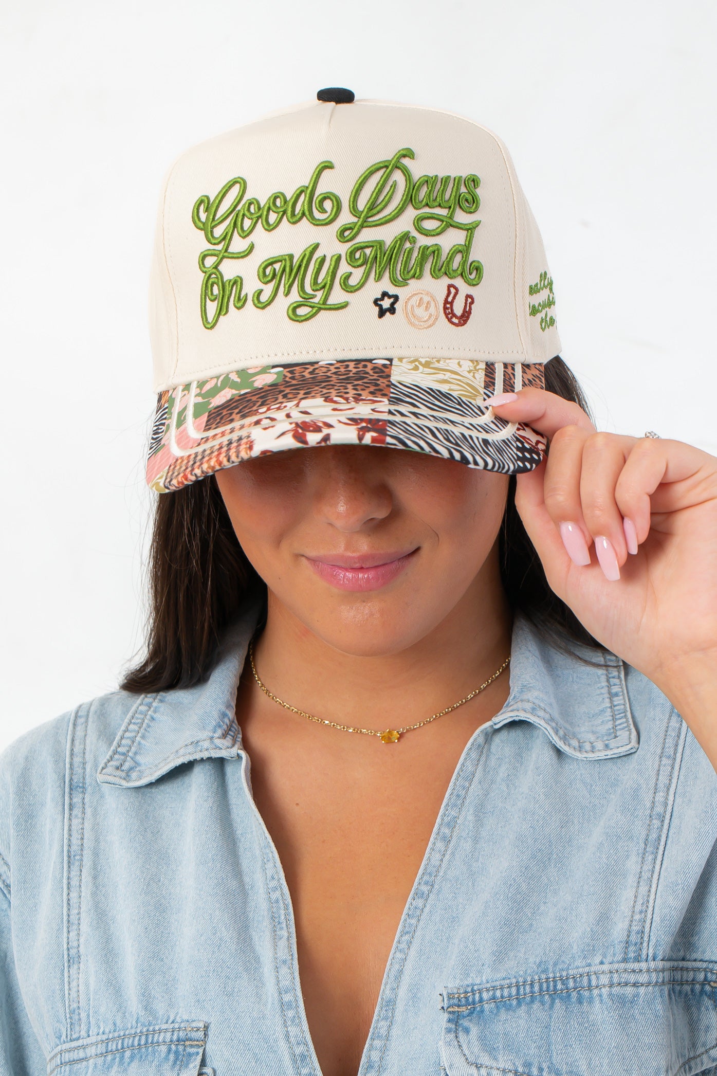 Good Days on My Mind Pattern Play Canvas Trucker Hat with embroidered front text and colorful patterned brim, available at L Mae Boutique.