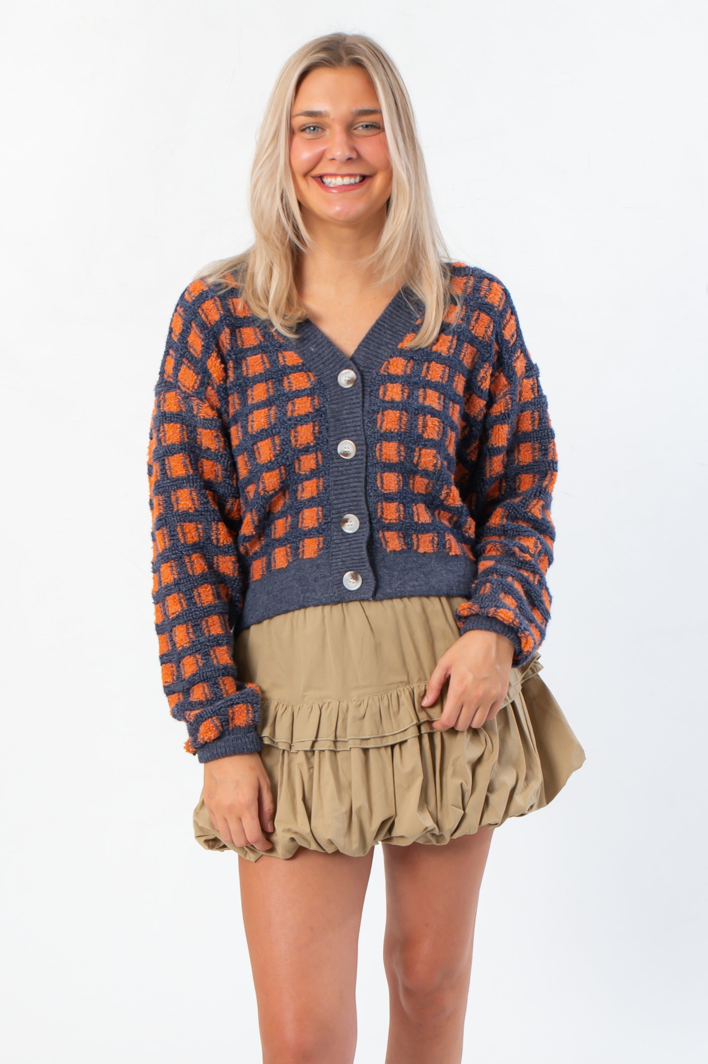 Blue Ridge Plaid Checkered Cardigan in navy with orange check pattern, button-up front, styled for fall layering in women's fashion.