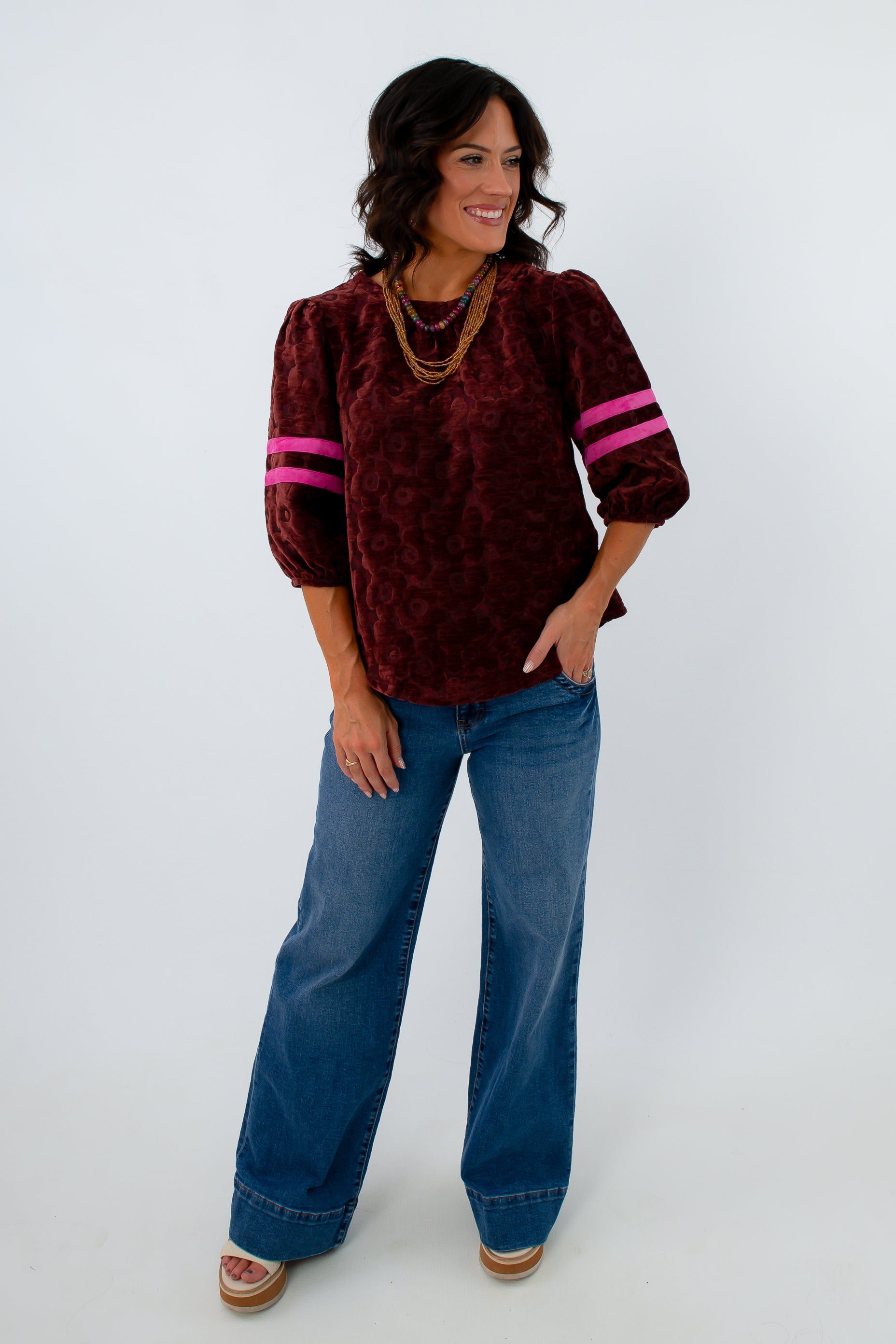 Burgundy velvet top with pink stripe and floral detailing, fall workwear, long sleeve burgundy velvet top