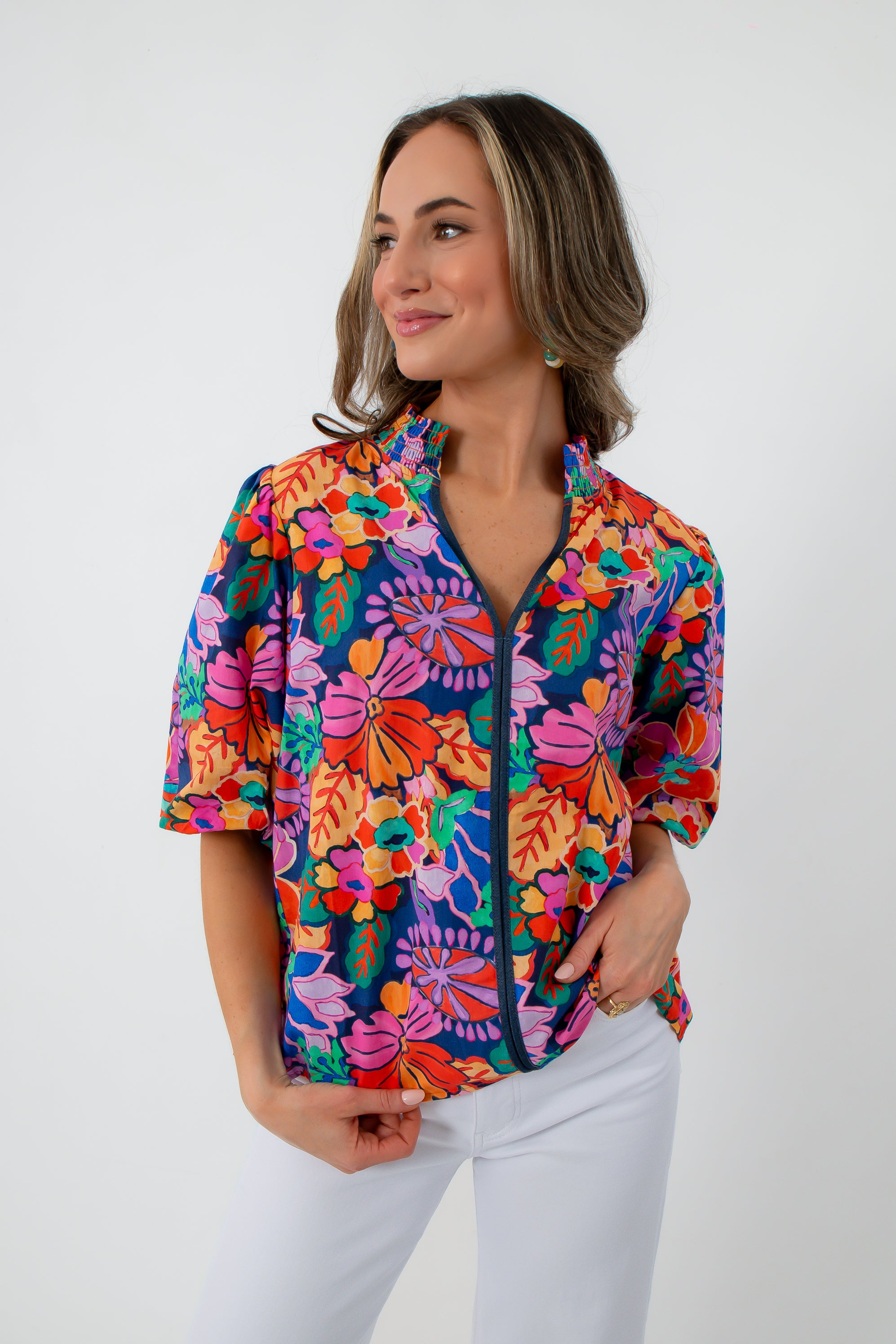 Colorful floral blouse with puff sleeves and zip front