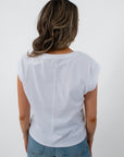 White jersey top for casual layering, back view
