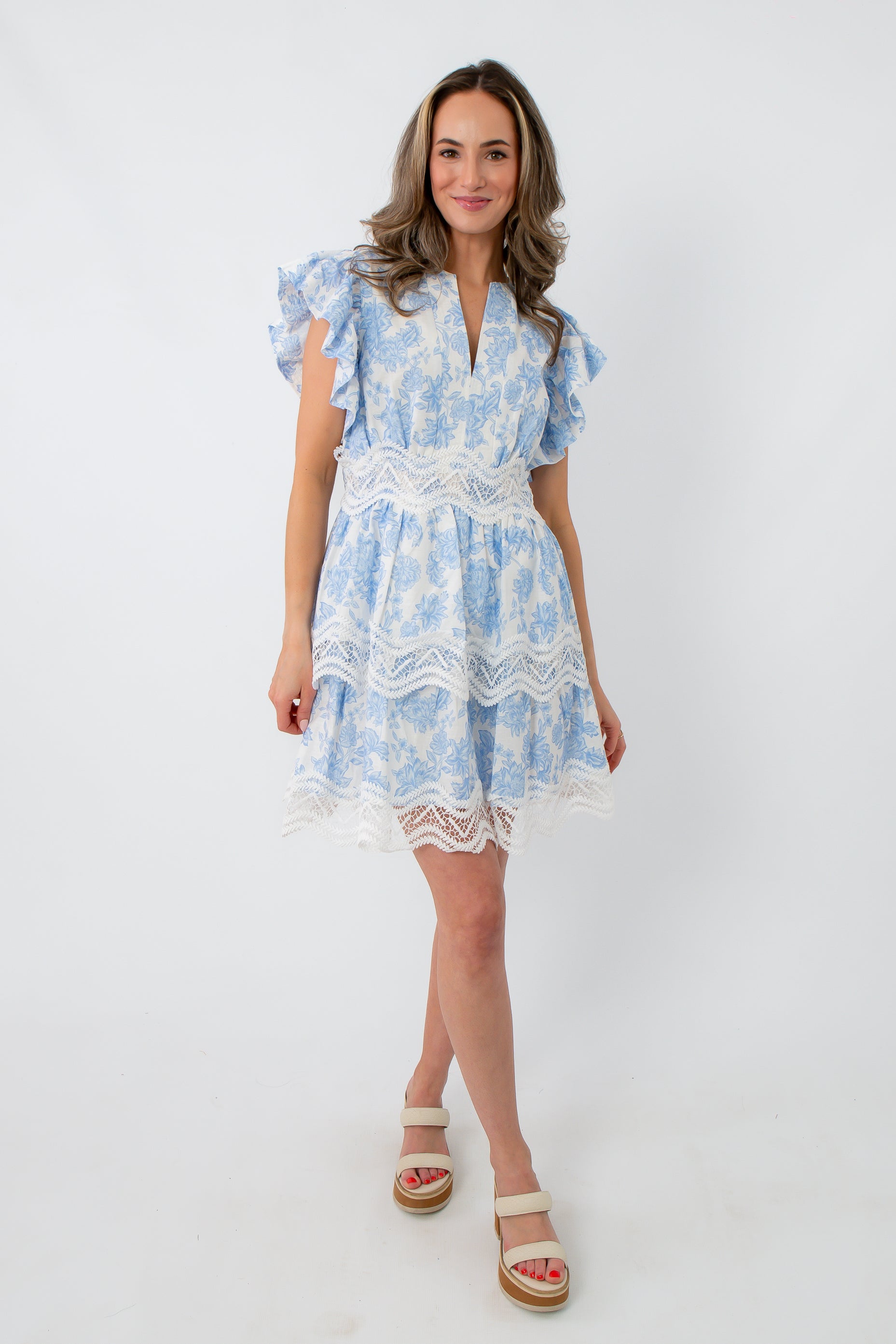 Blue floral lace trim mini dress with ruffled sleeves and tiered skirt