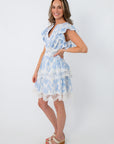 Blue floral lace trim mini dress with ruffled sleeves and tiered hem for summer occasions