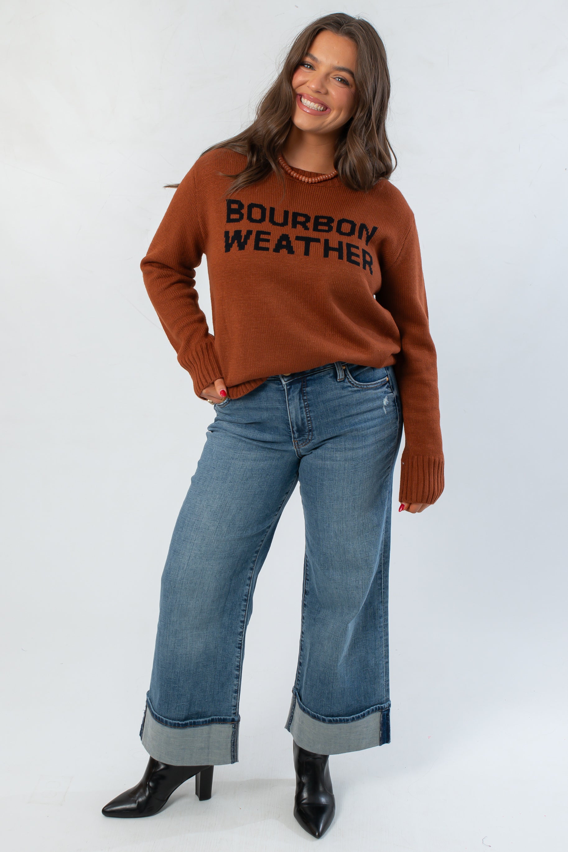 Cozy Bourbon Weather Intarsia Knit Sweater styled with wide-leg jeans and black boots, ideal for stylish cold-weather outfits.