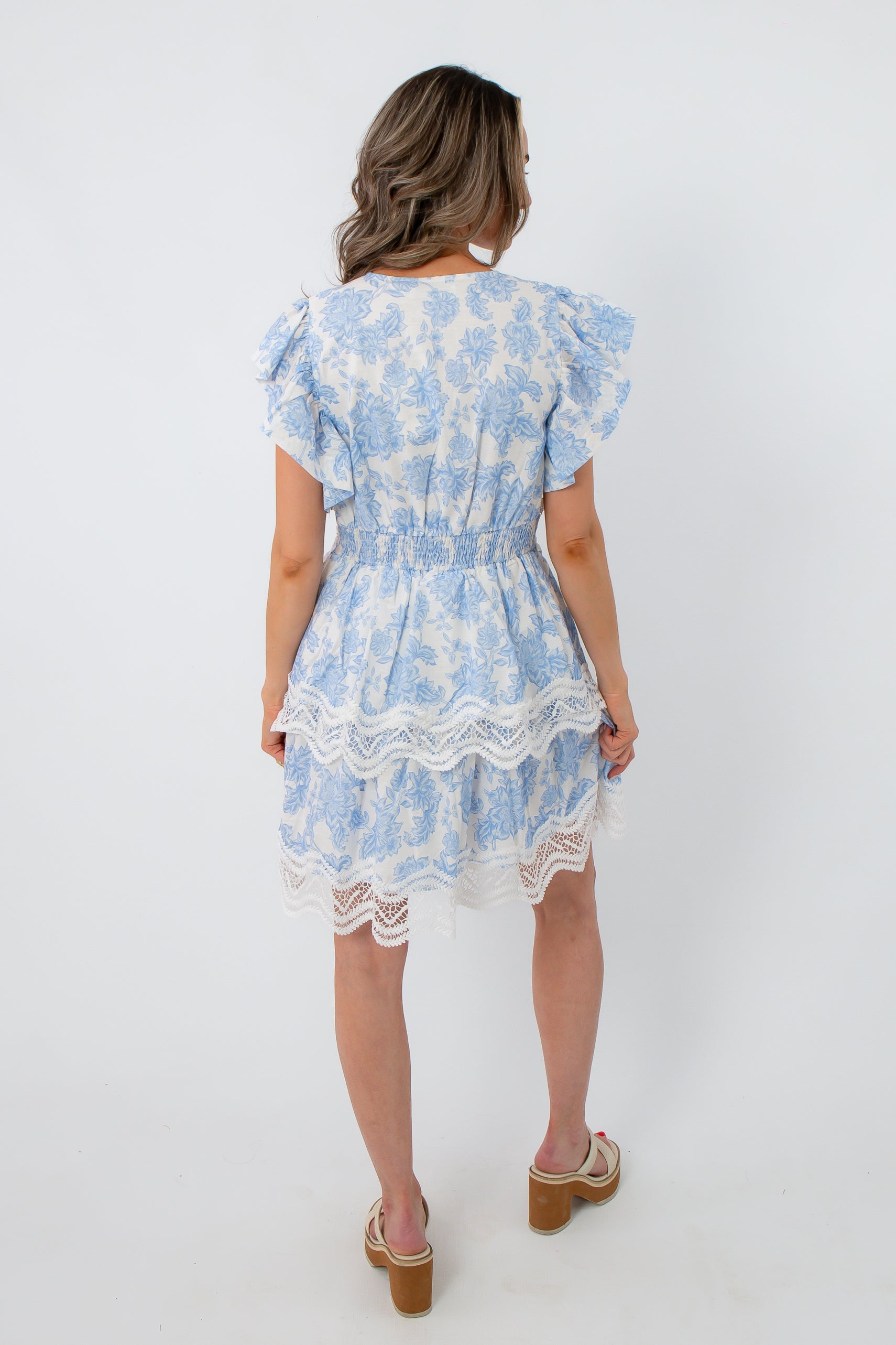 Blue floral lace trim mini dress with ruffled sleeves and tiered lace hem