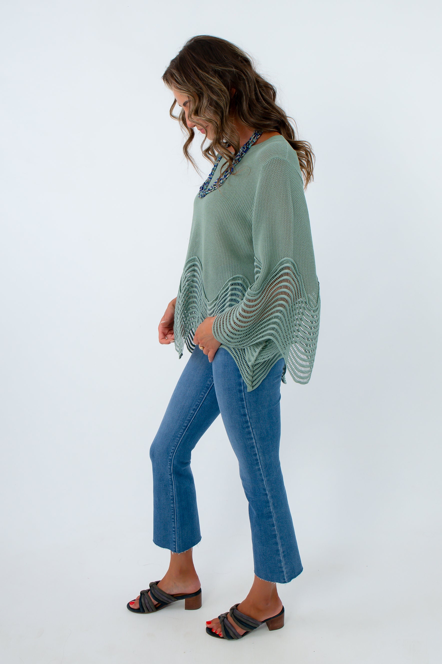 Sage green fall top with wave hem and sleeves, top with wavy sleeves, sage green top with long wavy sleeves