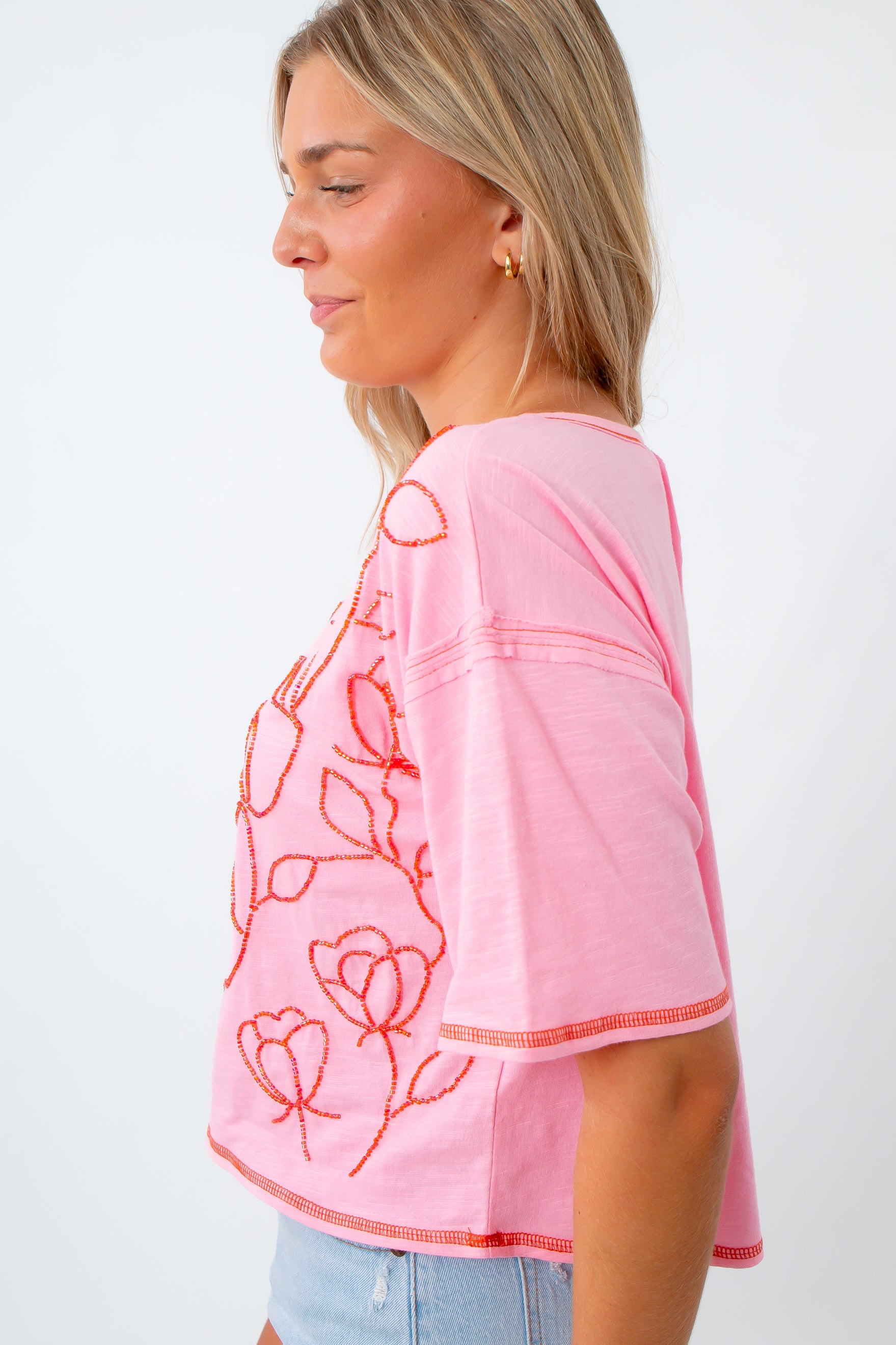 pink and red beaded graphic t shirt