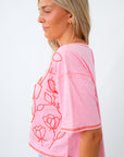 pink and red beaded graphic t shirt