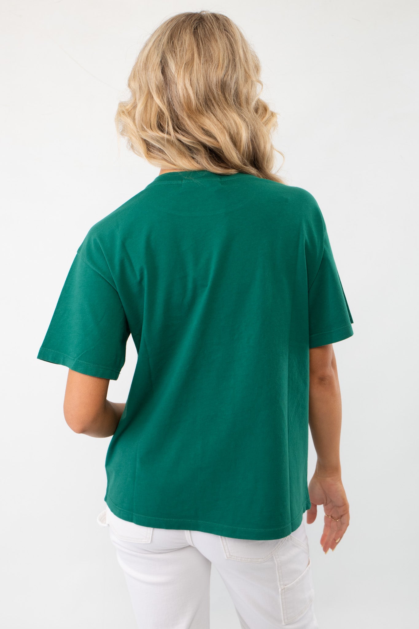 Back view of the Daydreamer Green Waylon Jennings Outlaw Legend Graphic Tee, showcasing its relaxed fit and breathable cotton material.