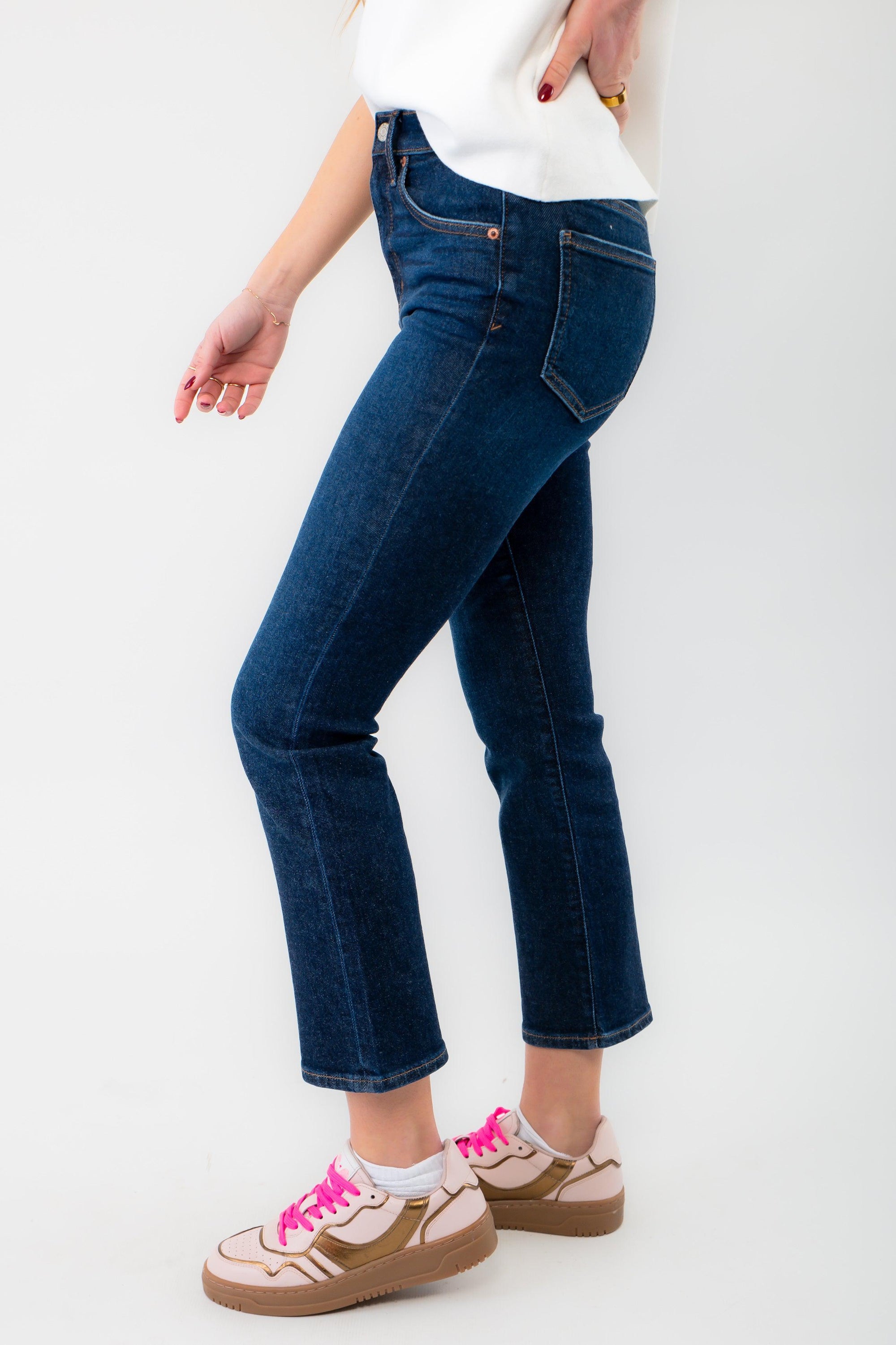 Side view of Daze Deep Kiss Shy Girl Crop Flare jeans, showcasing the sleek silhouette and comfortable stretch Hug denim fabric.