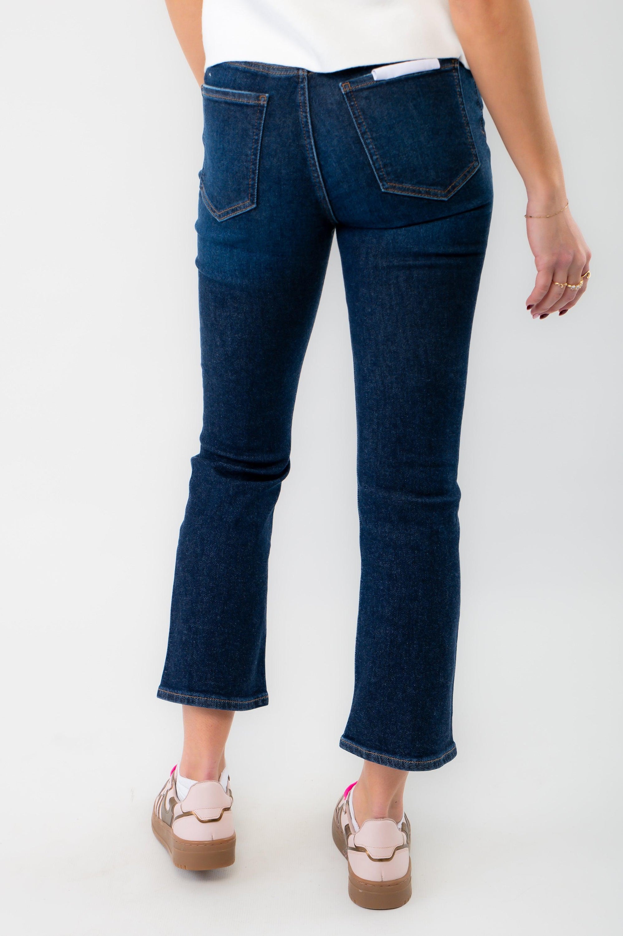 Back view of Daze Deep Kiss Shy Girl Crop Flare jeans, highlighting the classic pocket design and flattering cropped flare cut.