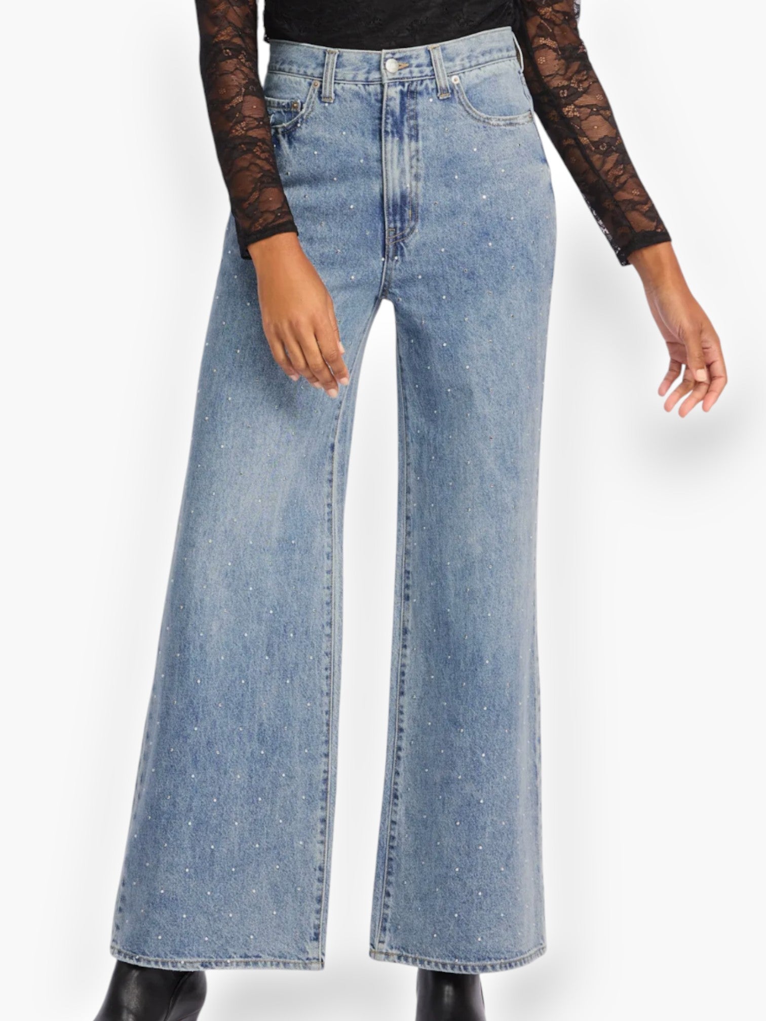 Daze Denim Far Out High Rise Studded Jeans featuring a wide-leg fit and shimmering crystal embellishments. Perfect for a bold and stylish look.