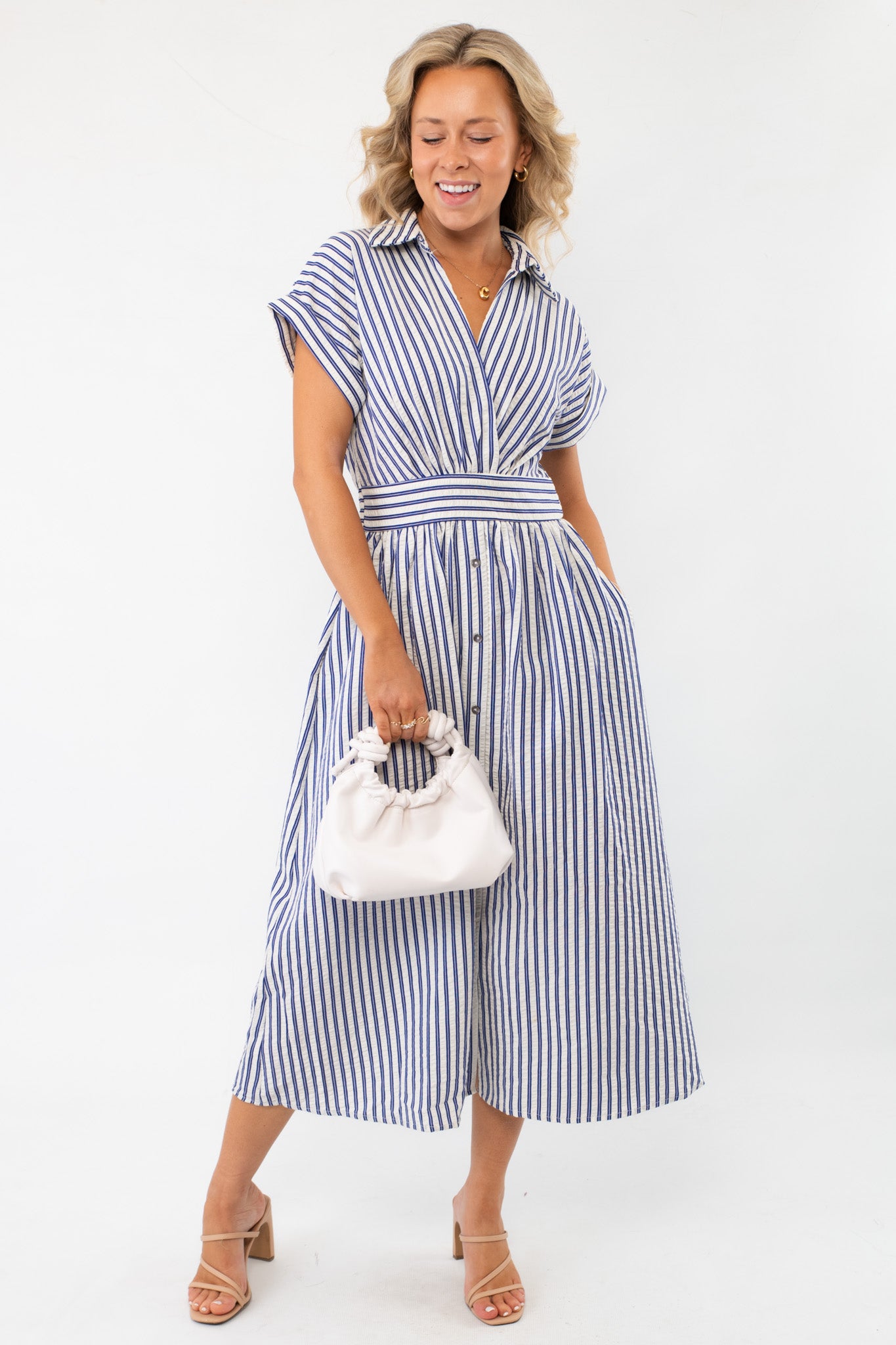 Favorite Things Blue Striped Midi Dress featuring a deep V-neckline, collared design, and button-down front. A chic and versatile outfit for any occasion.