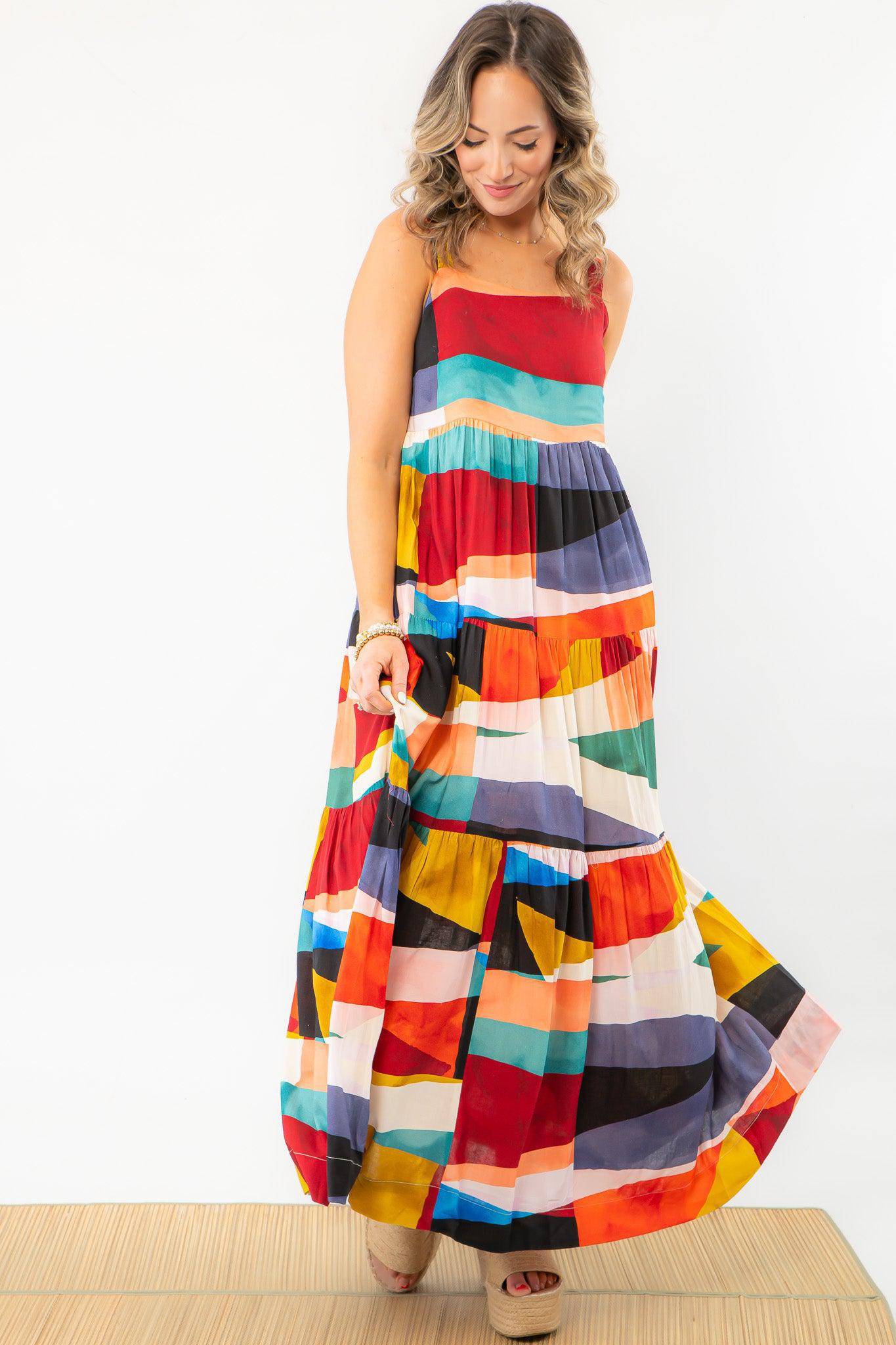 Trendy and comfortable color block maxi dress with a flowy silhouette. Ideal for beach trips, vacations, and stylish casual wear.
