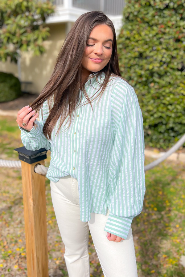 High Tide Sage Green Stripes Button Down Shirt featuring an oversized fit, balloon sleeves, and a chic striped pattern for effortless beach style.