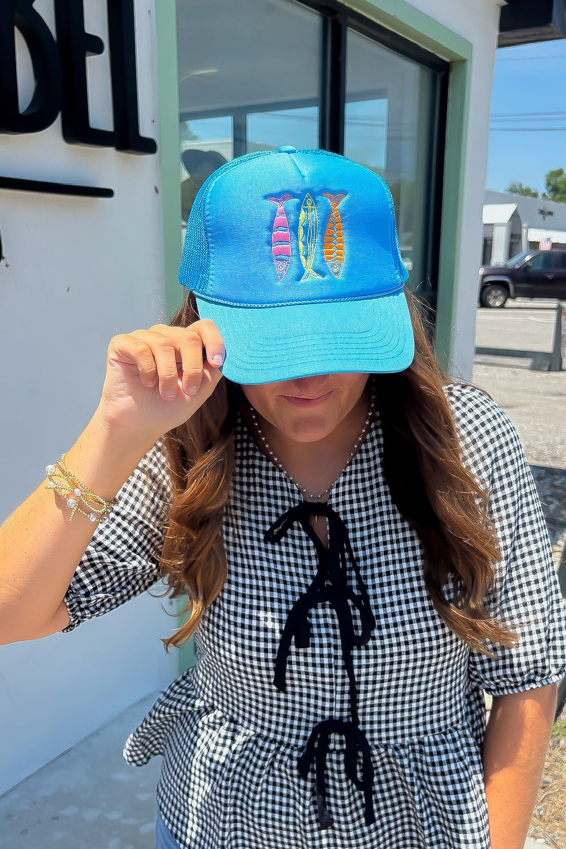 Cool Blue Sardine Trucker Hat – Embroidered Snapback for Summer with three colorful sardines on front, breathable mesh back, and vibrant blue foam front.