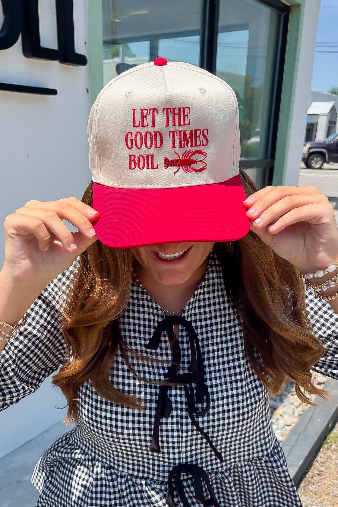 Let The Good Times Boil Red Trucker Hat – bold red lobster embroidery on canvas front, perfect seafood boil accessory for summer events.