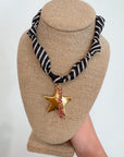 USC Gamecock Scarf Necklace with black and white striped bandana and gold star charm featuring red 'Gamecocks' text, ideal for game day wear.