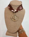 Neutral Moon USC Gamecock Bandana Necklace featuring a mauve floral scarf and bold gold Gamecock pendant, perfect for gameday jewelry styling.
