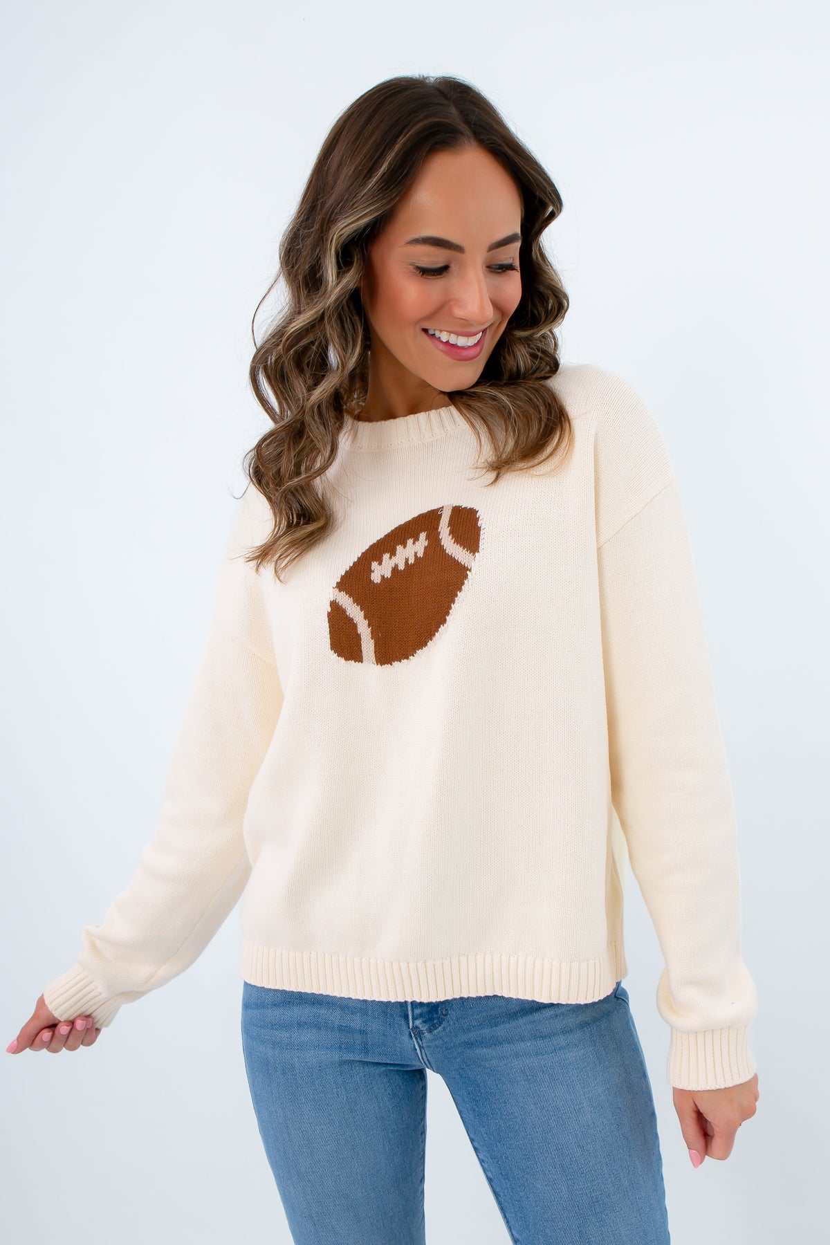 Neutral football sweater with ribbed trim, fall neutral game day sweater, neutral game day sweater with footballs
