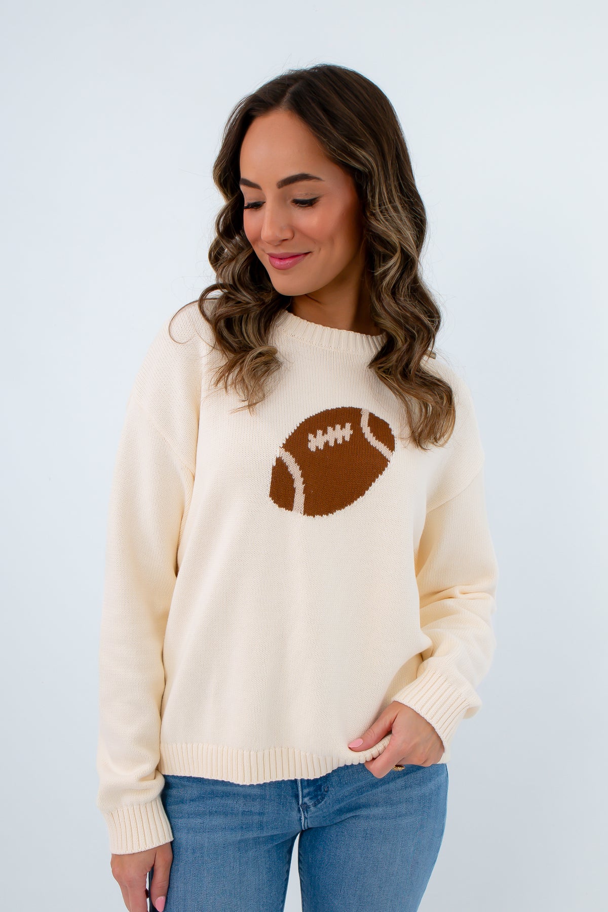Comfortable fall game day sweater for women, cream sweater with brown football icon, football sweater for fall game day