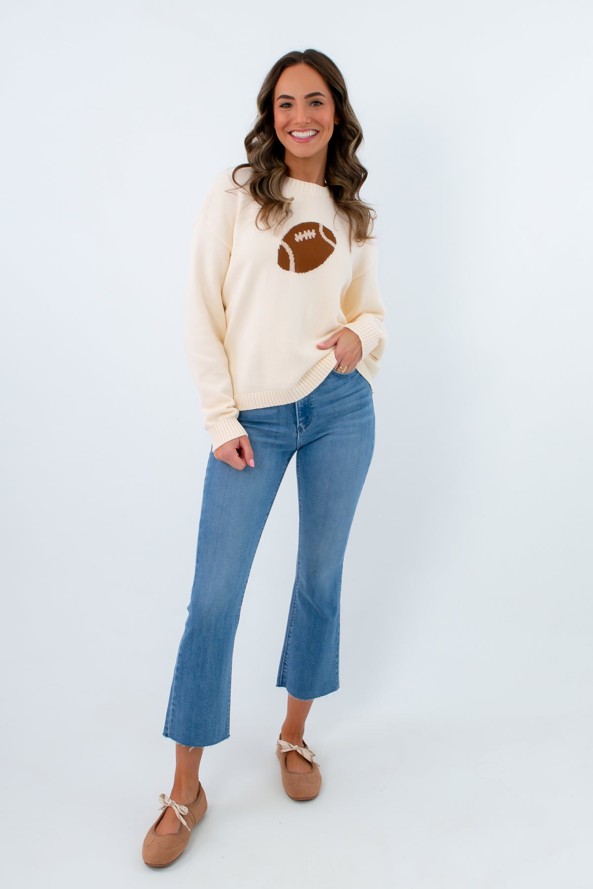 Lightweight cream sweater with football icon, sweater with football on it, football sweater for game day