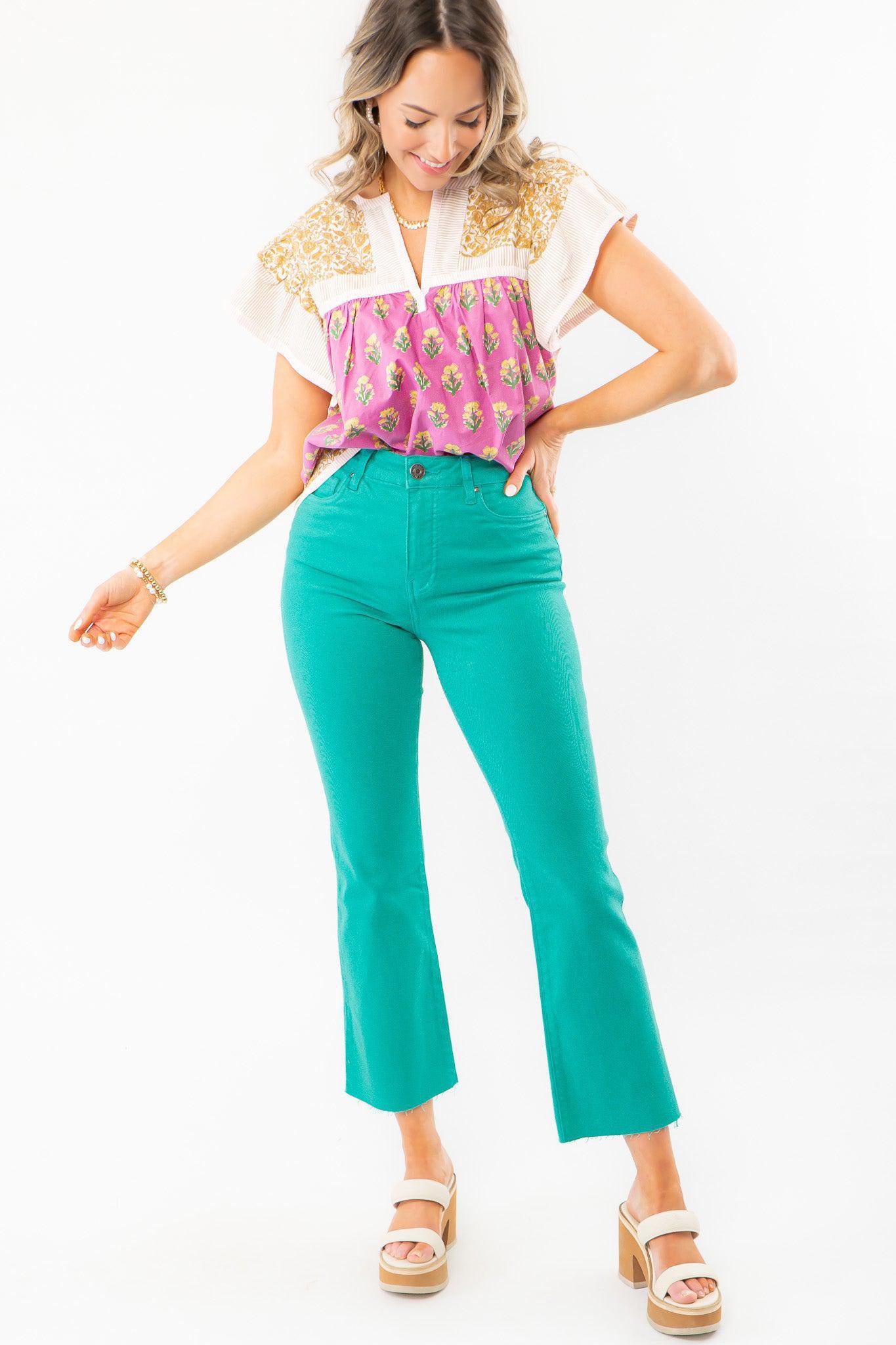 KUT Turquoise Kelsey High Rise Ankle Flare Jeans with a bold summer look. Featuring a high-rise fit and modern ankle flare, perfect for vibrant styling.