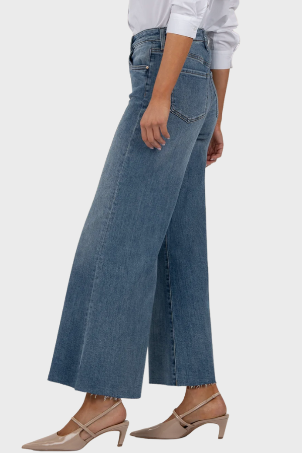 Side view of Kut Adaptability Ryan High Rise Super Wide Leg Denim, highlighting the structured fit, wide-leg silhouette, and raw hem detail.