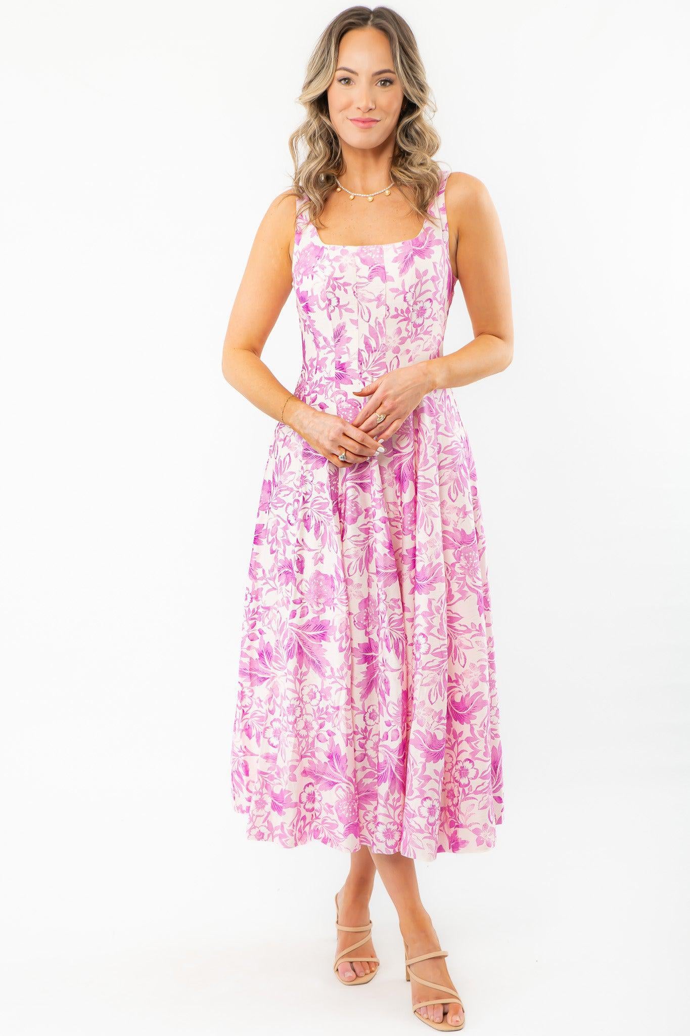 Elegant Layton Blush Tropical Print Midi Dress with a flattering fit-and-flare silhouette. A must-have dress for vacations and warm-weather outings.