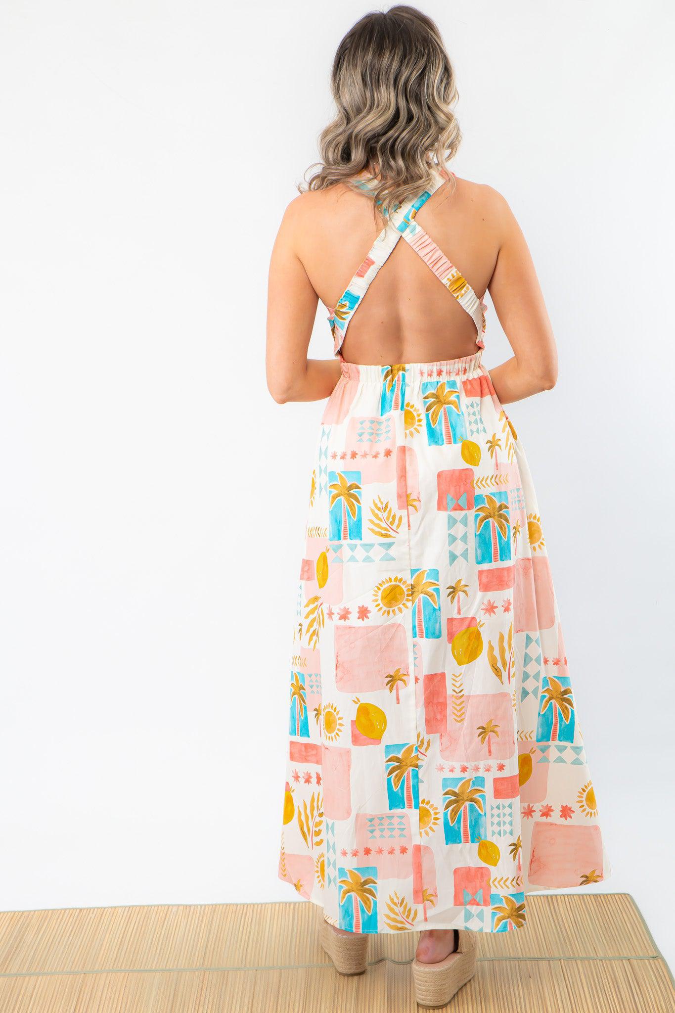 Back view of the Moroccan Coast Tile Print V-Neck Maxi Dress showcasing a stylish open-back crisscross design, ideal for warm-weather getaways.