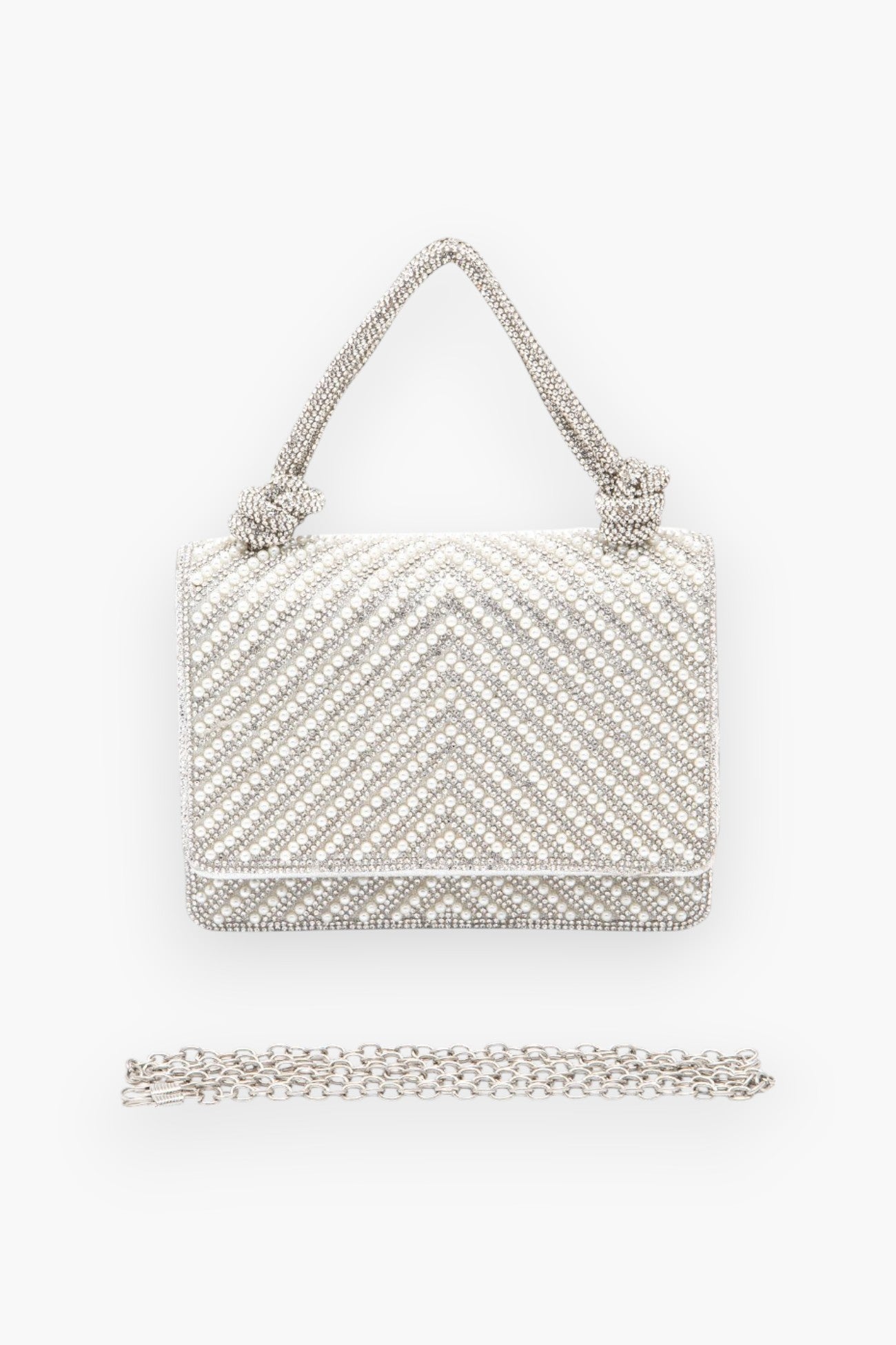 Front view of the pearl studded rhinestone handle clutch bag with a detachable chain strap, highlighting its intricate beaded design and structured silhouette.