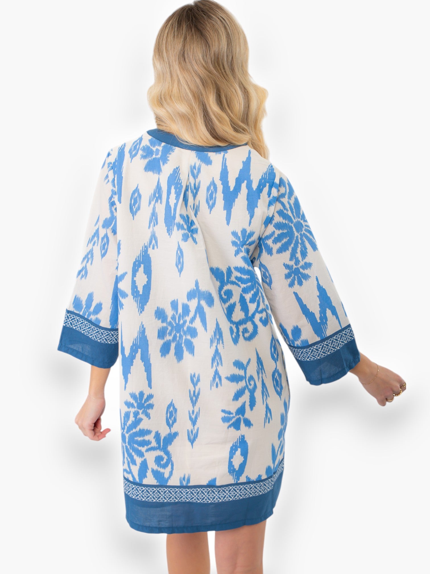 Back view of the Priscilla Blue Print Kaftan Dress showcasing its flowing silhouette and vibrant blue print on lightweight fabric.