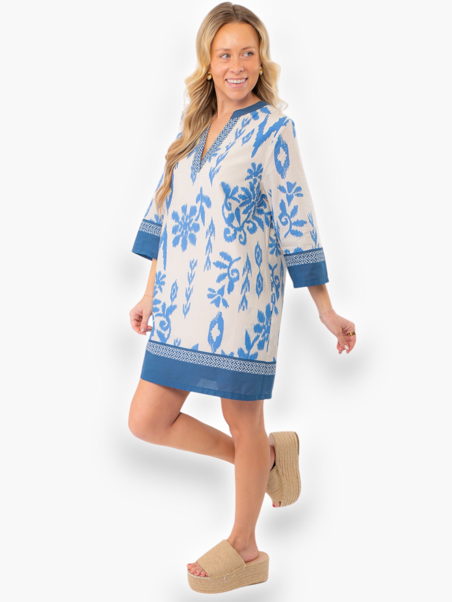 Model wearing the Priscilla Blue Print Kaftan Dress with wedge sandals, showcasing its versatile and fashionable vacation-ready design.