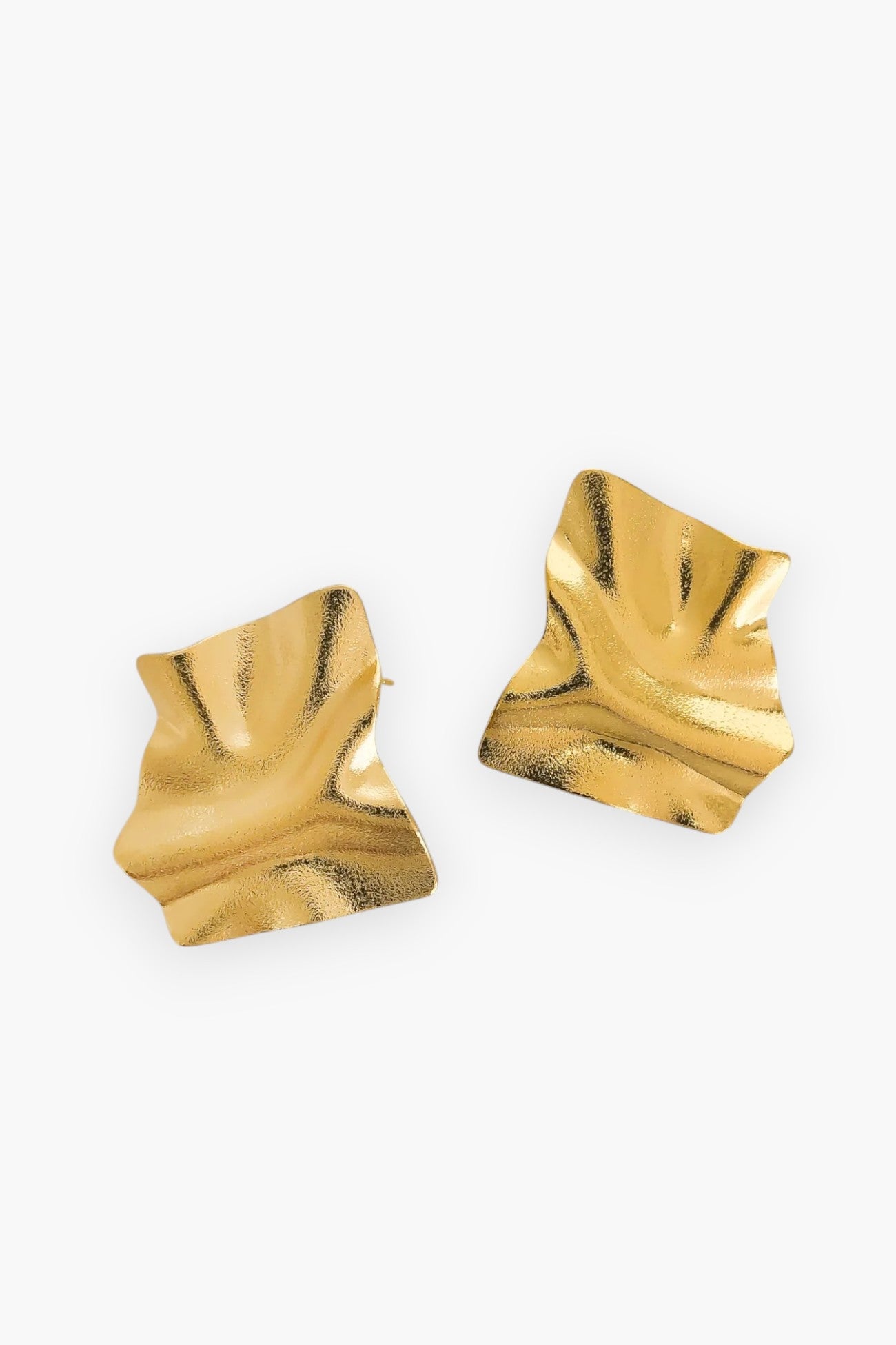 Stylish Riley Gold-Plated Wavy Earrings with a sculptural, fluid shape. These bold, statement earrings are perfect for fashion-forward looks and special occasions.