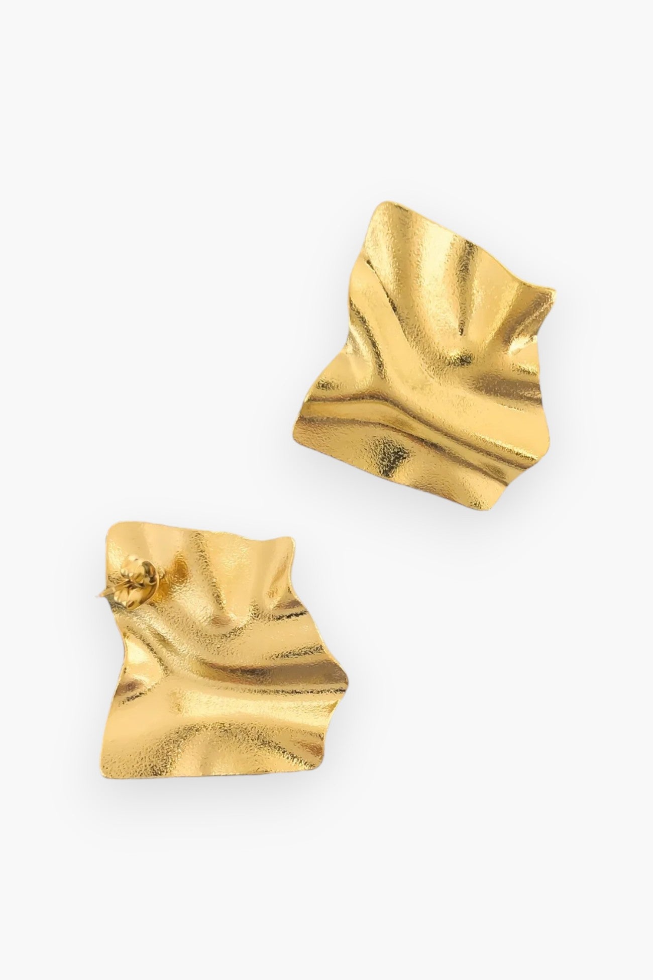 Riley Gold-Plated Wavy Earrings featuring an abstract, textured design with an 80s-inspired elegance. Triple-plated gold, water-resistant, and 1.2 inches in length.