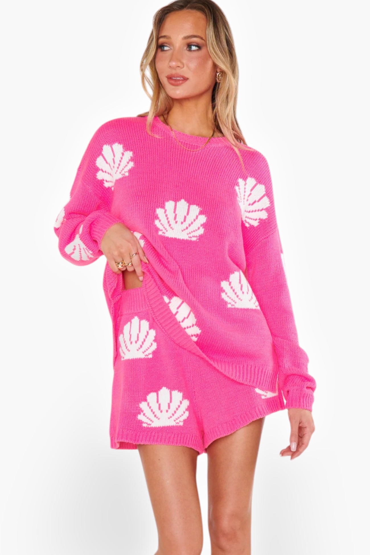 Vibrant Show Me Your Mumu Hot Pink Shell Boardwalk Shorts with cozy knit fabric and white shell design, perfect for beach days and casual outings.