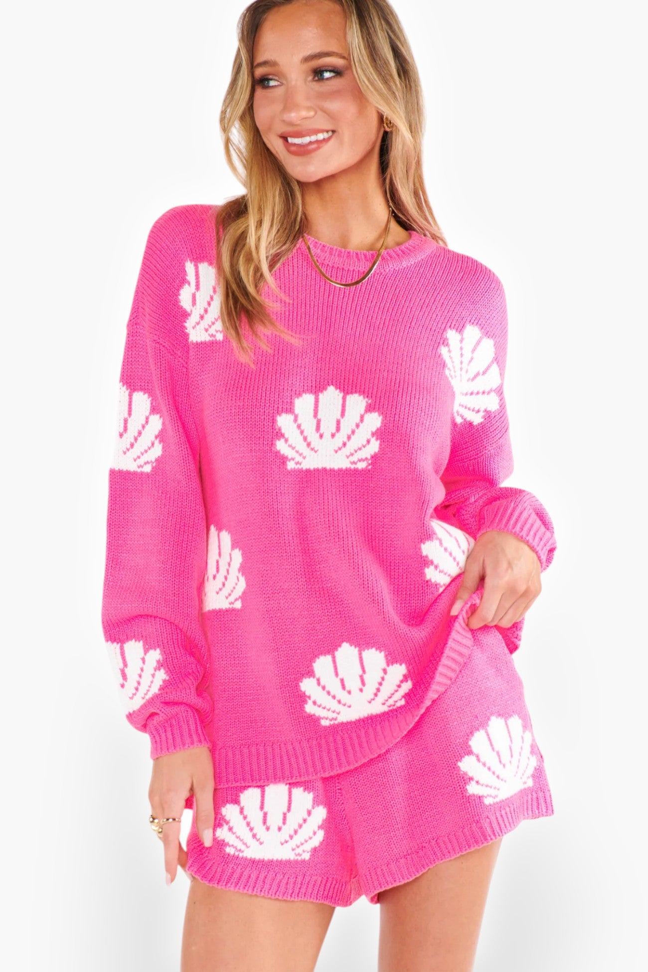 Trendy Show Me Your Mumu Hot Pink Shell Boardwalk Shorts with a soft knit texture and elastic waist, ideal for vacations and spring break looks.