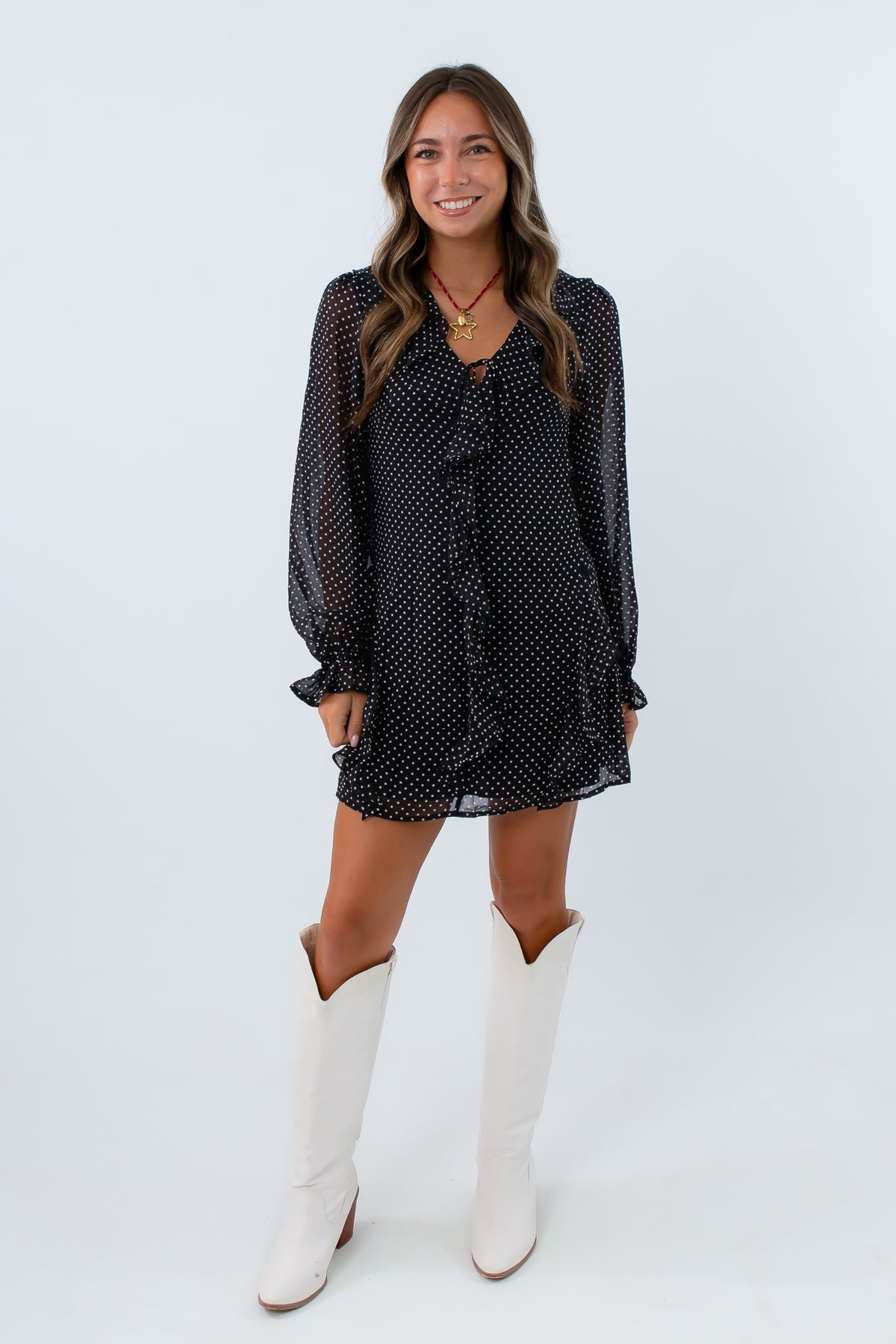 Flowy black polka dot mini dress with sheer sleeves for fall, Lightweight long sleeve fall dress with playful ruffle detail