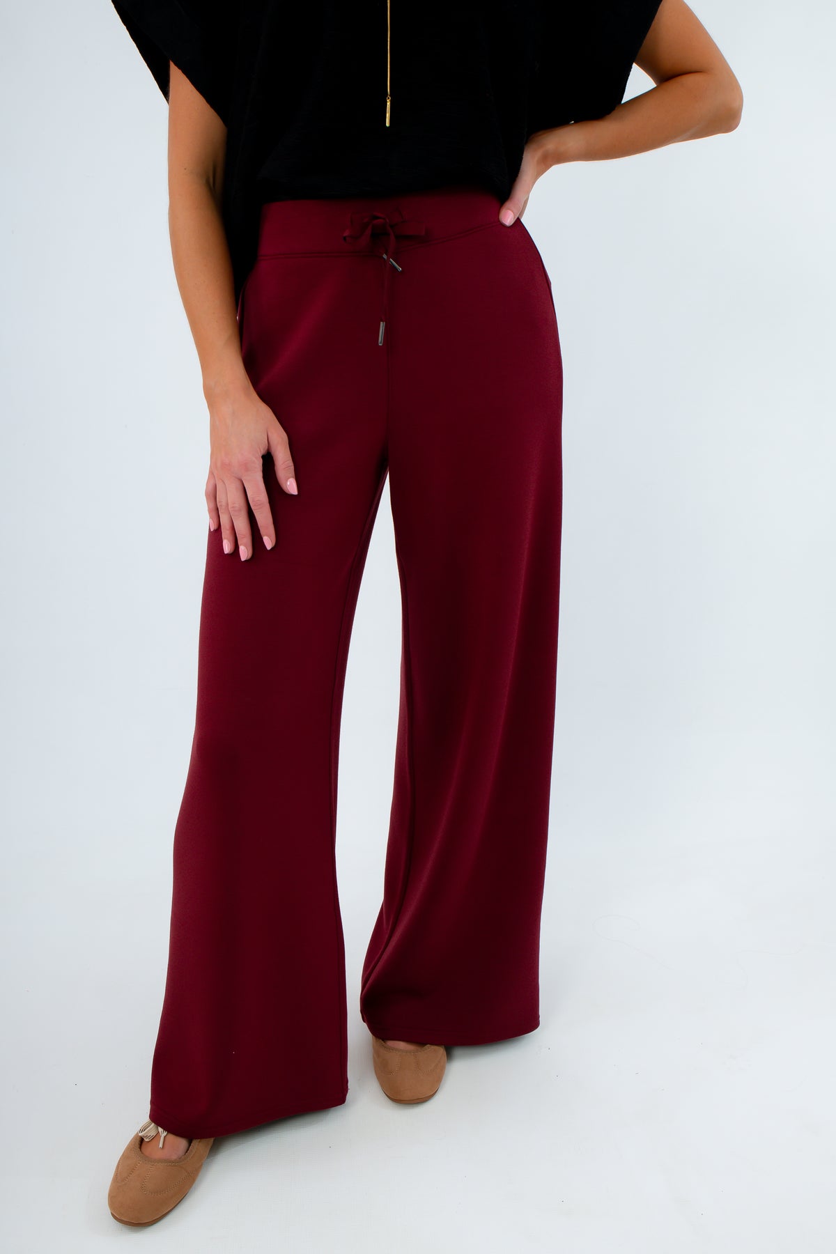 Burgundy lounge pants with 4-way stretch, Spanx Airessentials Wide Leg Pant in burgundy wine color, garnet lounge pants