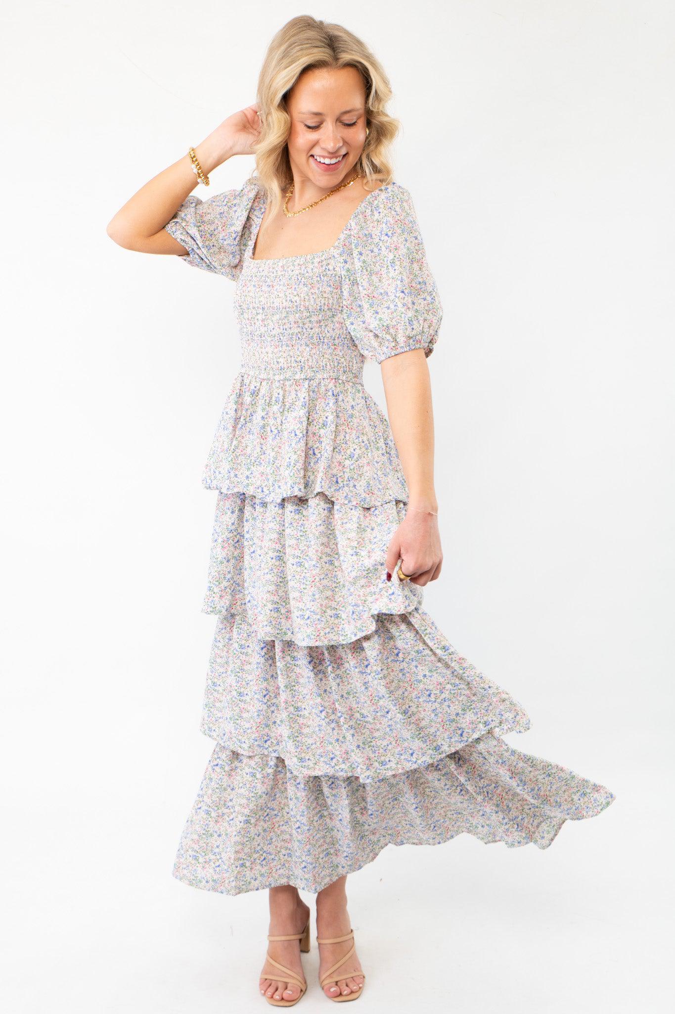 Elegant Spring Florals Smocked Tiered Puff Sleeve Midi Dress with a flowing tiered skirt and puff sleeves, ideal for a graceful spring look.